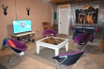 Extensive Game Room with 50-inch TV, Pool Table, Air Hockey & Ms. Pac Man